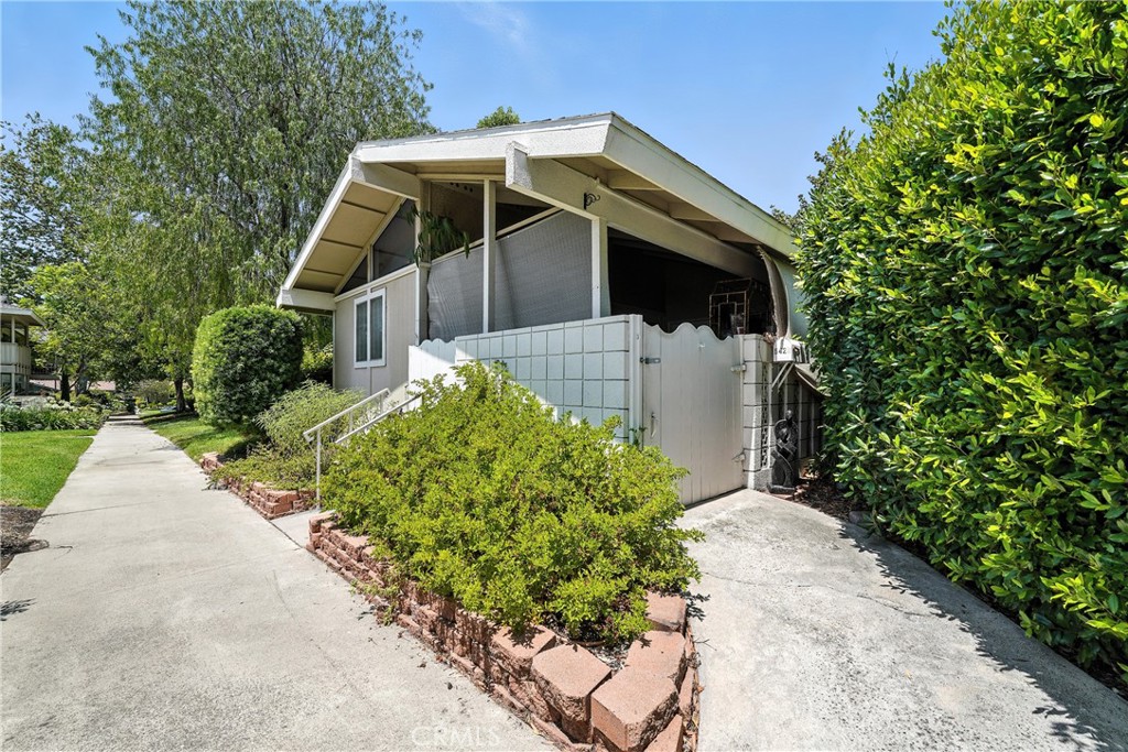 This charming La Corona unit offers approximately 850 square feet of well-designed living space, enhanced by vaulted ceilings and an open floor plan that creates a spacious, airy feel. The bright and inviting living room features abundant natural light from a large window and sliding glass door, which opens to a private rear yard—perfect for enjoying indoor-outdoor living and capturing the afternoon breeze.
The spacious eat-in kitchen includes a second sliding glass door that leads to the generously sized, covered front patio—a favorite spot for relaxing or entertaining. HOA-owned and maintained appliances provide added peace of mind.
Located in the vibrant 55+ community of Laguna Woods Village, residents enjoy an exceptional array of amenities including:
7 Clubhouses
5 Swimming Pools
2 Fitness Centers
Tennis & Pickleball Courts
A Library and Book Clubs
2 Professional Golf Courses & a Driving Range
Onsite Restaurant
Equestrian Center
Bridge, Bocce Ball, Woodworking, Photography, Ceramics, Painting & More
Over 200 Social Clubs and Organizations
All this, just minutes from shopping, dining, medical facilities, entertainment, and easy freeway access.
Come see why this could be your perfect next home and start enjoying the Laguna Woods lifestyle today!