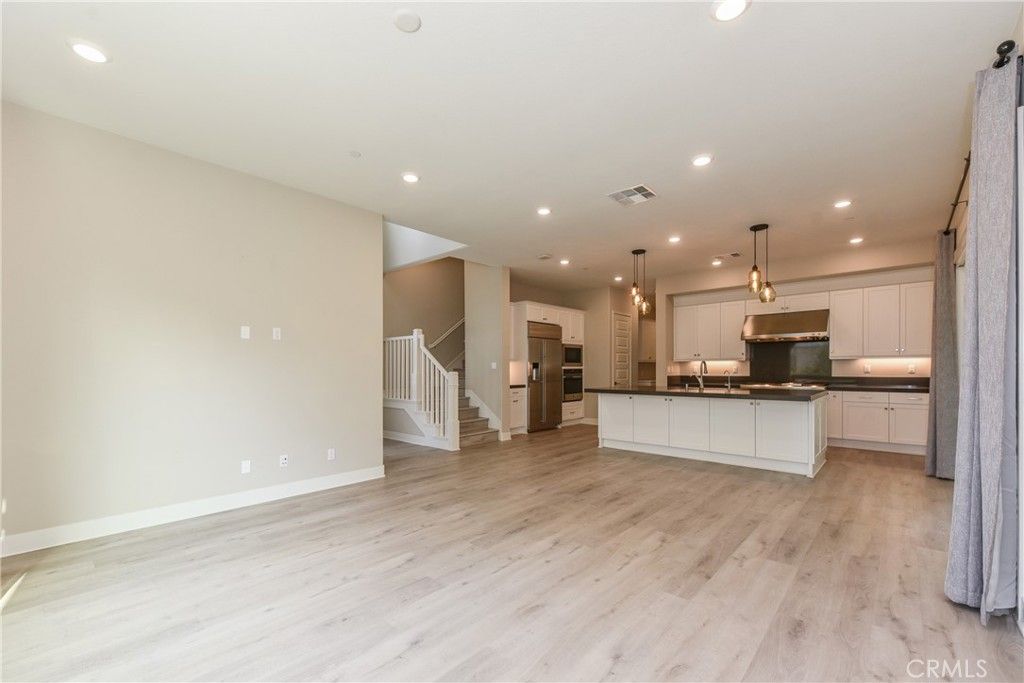 Photo of 113 Pitch, Irvine, CA 92618 (MLS # OC26001718)