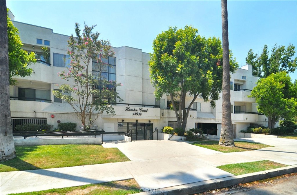 Beautifully updated, move-in-ready condo nestled in a charming complex available for lease. Tastefully remodeled throughout, this home features fresh interior paint, new plush carpet in the bedrooms, and stylish newer plank flooring for a modern touch. The open-concept layout seamlessly connects the spacious living room, dining area, and kitchen highlighted by a cozy fireplace that adds warmth and charm to the space. This rare and versatile floor plan includes dual primary suites on opposite sides of the home, each with a walk-in closet and private, fully upgraded bathroom—ideal for roommates or guests. Both bathrooms have been tastefully updated with newer shaker vanities, countertops and tile. The remodeled kitchen boasts newer white shaker cabinets, sleek quartz countertops, and stainless steel appliances. Conveniently located on the first floor with easy stair access, this unit offers added accessibility and comfort. Subterranean gated garage with tandem parking for two cars. Ideally located near shopping, entertainment, and dining with easy access to major freeways.