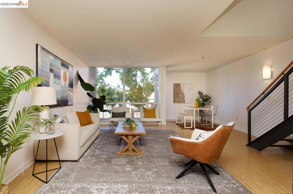 Sexy Loft in the East Bay’s popular NOBE neighborhood (North Oakland/Berkeley/Emeryville). Incredible floor plan (+/- 1539 sq ft) features expansive upper level flex space. Transform the upper level bedroom into a luxurious oversized retreat, or create the home office/workspace of your dreams. Dramatic floor-to-ceiling windows on both-levels. View of nature & greenery give this home a modern treehouse vibe. Main living area opens to private balcony. Open & airy L-shaped chef's kitchen w/stainless appliances and room for island. Bed/Bath suite features walk-in closet. ½ bath on lower level. In-unit washer/dryer. Floors have radiant heat (HOA dues cover radiant heat & hot water).1 parking + community EVCS. Great shopping, restaurants & transit nearby. Easy access to SF & greater Bay Area. Catch the Emery-Go-Round to MacArthur BART; pickup 1 block away!