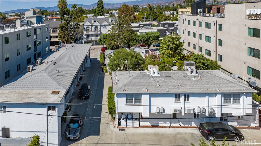 The Buildings:
This 18-unit apartment building is a standout property featuring three separate structures on an expansive 19,496 square foot lot. The units offer a versatile mix of studio, one-bedroom, and two-bedroom apartments, providing approximately 9,435 square feet of total living space. Additionally, the property includes 20 dedicated parking spaces, offering convenience and added value for tenants. With LAR3 zoning and TOC Tier 3 incentives, the property presents excellent potential for future development or redevelopment, making it an investor’s dream in the heart of Los Angeles.
Public Transportation and Desirable Demographics:
The property is ideally located just minutes from the North Hollywood Metro Station, which serves the Red Line subway and the Orange Line bus rapid transit. This ensures quick access to Downtown LA, Hollywood, and other major hubs, making it perfect for professionals, artists, and young families. The neighborhood’s artistic vibe and proximity to entertainment industries continue to attract a growing population of renters, making it an ideal spot for long-term rental income.
Property History:
This property has an intriguing history of strategic modifications that have maximized its potential over the decades:
1949: The front house was converted into two units, marking the beginning of the property’s evolution into a multi-family complex. 1961: The rear building, originally two units over garages, underwent a transformation. The garages were converted into four additional units on the first floor, creating a total of six units in the rear structure.
1983: The adjacent building at 10818 Blix Street was converted into seven units, plus the inclusion of three Studios, further expanding the property’s rental capacity.
Reason to Buy:
This 18-unit investment property offers tremendous upside potential through both rental income and redevelopment opportunities. With the added value of LAR3 zoning and TOC Tier 3, developers can explore expansion possibilities in a prime location with significant demand. Its proximity to entertainment, public transit, and major freeways, combined with 20 parking spaces, make this property a top choice for investors looking to maximize returns in a high-growth area of Los Angeles. Whether you’re expanding your portfolio or seeking a high-value redevelopment project, 10814 Blix Street is a rare find in the thriving Toluca Woods / North Hollywood market.