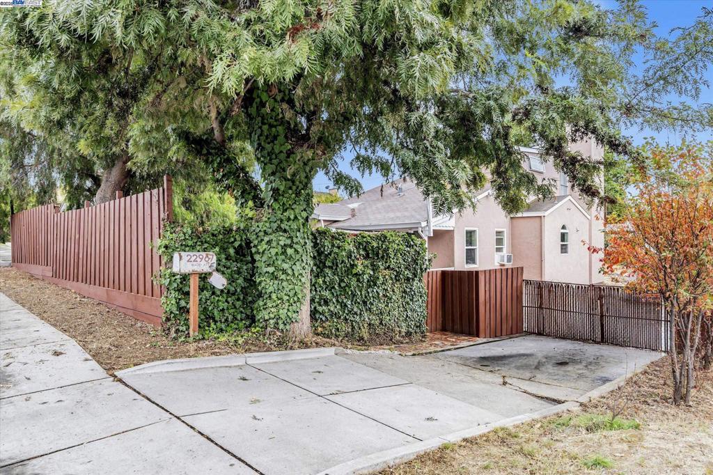 Welcome to 22967 Maud Ave, nestled in the desirable Hayward Hills! This 4-bedroom, 3-bath, 2,140 sq. ft. home offers a unique opportunity for both investors and large families. Sitting on an expansive 12,000+ sq. ft. lot, this property is packed with potential, versatility, and value. The main home is currently divided into two separate living spaces, each with its own kitchen and living area. Whether you’re looking to house multiple generations under one roof, co-purchase with another family, or streamline your rental income, the setup is perfect. For those wanting a single-family home, the layout can easily be restored to one cohesive space. The backyard is a dream for those seeking additional income or storage. It features multiple structures, including a converted 2-car detached garage now used as living quarters, a cottage, and four large storage units. The vast lot provides ample space for parking vehicles, storing equipment, or adding future enhancements. With endless possibilities for rental income, creative use of space, or expansion, this property is a rare find in the heart of the Hayward Hills. Don’t miss your chance to see the incredible potential of this home with your own eyes. Your search is over—welcome home!