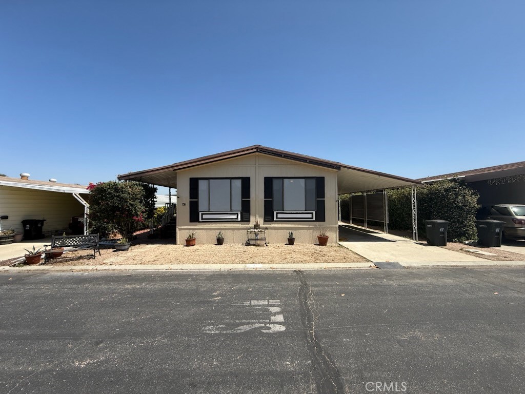 Experience affordable and comfortable living in Heather Estates 55+ community! Welcome to this charming 2-bedroom, 2-bath 1,440sf manufactured home located in a well-maintained park with outstanding views of the community lake and surrounding park. This home offers a comfortable and functional layout with a bright living area, open kitchen and 2 cozy bedrooms. Also included are a ramp and an elevator in the carport so there's never a need to climb stairs! With a solid foundation, this property is ready for all your personal touches! Enjoy the convenience of multiple park amenities including a beautiful clubhouse, library, shuffleboard, an outstanding pool and spa, frequent organized social events and tons of guest parking. With nearby shopping, dining and easy access to major roads, this is a fantastic opportunity for affordable homeownership. Schedule your showing today and imagine the possibilities!