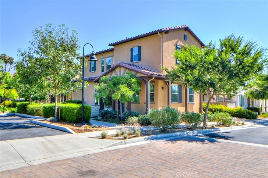 This is a beautiful detached home located in the desirable newer gated community, "Courtyards at the Upland Hills". Adjacent to the Upland Hills Country Club Golf Course, this Plan 2 home features an open floor plan with living, dining, kitchen, powder room on the first floor with direct access to front porch and backyard; and 2nd floor with a loft and 2 spacious bedrooms, a full bath, plus a master suite. Luxury vinyl planks on the ground floor and upgraded carpet for stairways and upstairs loft and bedrooms.  Other upgrades are plantation shutters and ceiling fans.  Front porch offers views of the community entry and amenities of pool/spa/BBQ.  This energy efficient home has solar panels providing low cost electricity, whole house fan keeps it cool in hot summer days and the home is wired for security system. Kitchen is equipped with GE Stainless Steel appliance, large farmhouse sink, center island for eat-in, kitchen cabinets with self-closing drawers, and a large pantry. LG Refrigerator, washer and dryer are included. Master Suite has a spacious sleeping area, 8 ft glass door for views of the mountain, a walk-in closet, and a spacious master bathroom with large tiled walk-in shower, linen closet, dual vanities and a separate water closet. The two secondary bedrooms are spacious. Direct access to the attached 2-car garage with driveway that can accommodate additional parking needs. Sits on a corner lot. There is NO Mello Roos Taxes for this community.  The Courtyards offers homeowners abundant opportunities for leisure and recreation including an exclusive community pool, spa, dog park and BBQ area. Walk to the golf course next door, enjoy nearby restaurants, shopping, sports parks and various other lifestyle amenities.