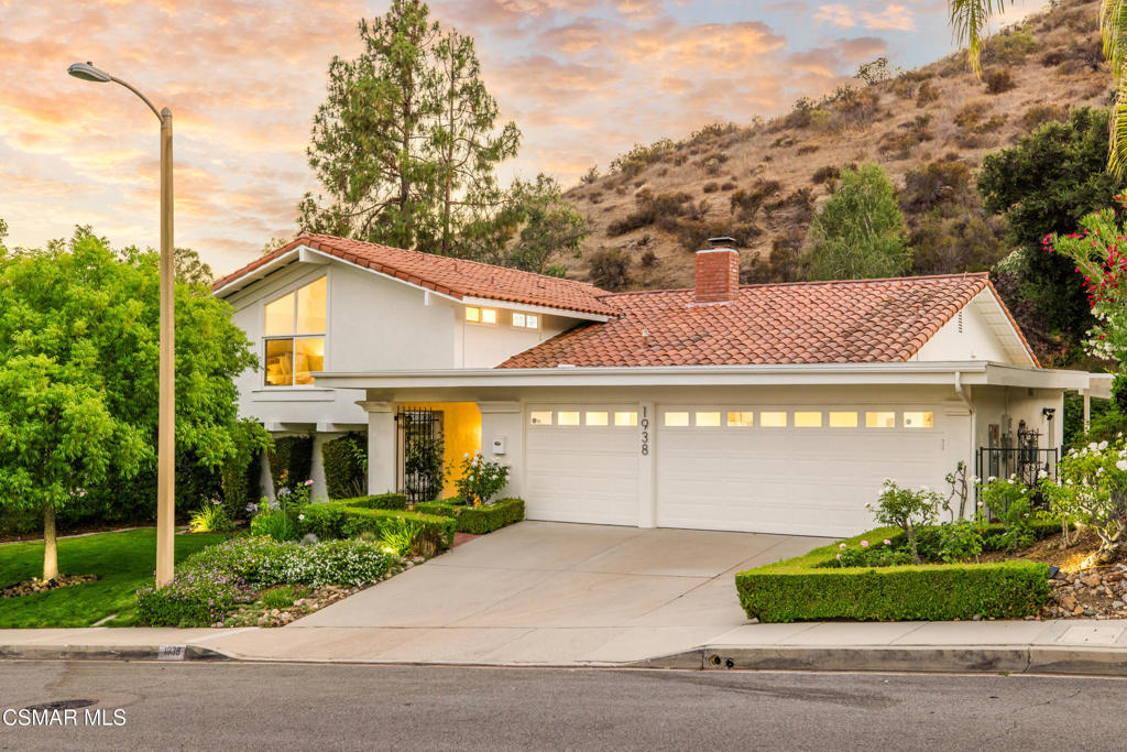Located in the sought-after Foxmoor Hills neighborhood of Westlake Village, this beautifully renovated 4-bedroom, 3-bathroom home offers 2,454 square feet of thoughtfully designed living space on nearly half an acre. Private, peaceful, and serene, this property is perfectly suited for entertaining and seamless indoor/outdoor living.The result of a full, down-to-the-studs renovation, every surface and detail has been carefully curated for modern style, function, and comfort. The home lives like new construction but with the warmth and quality of a custom build. Interior highlights include white oak hardwood floors throughout, dual-paned windows, custom solid wood doors, recessed lighting, smart home features (Nest thermostat, Ring doorbell, Kasa lighting, and a smart front door lock), and extensive built-in cabinetry for storage.The bright and airy main level features soaring ceilings, an open-concept living and dining area, and a show-stopping chef's kitchen. At the heart of the kitchen is the AGA Mercury induction range, an all-electric, high-end appliance prized for both performance and design. Additional highlights include Bosch appliances, a Monogram microwave drawer, a quiet, professional-grade Zephyr hood, custom cabinetry with pull-outs and soft-close drawers, quartz countertops, an Italian tile backsplash, and under-cabinet LED lighting.Just downstairs, a spacious lounge with a custom dry bar and new sliding doors offers a cozy spot to unwind or entertain. This level also features a private guest bedroom and a beautifully remodeled full bathroom.Upstairs, the tranquil primary suite is bathed in natural light and includes a spa-inspired ensuite bath with a soaking tub, designer tile and high-end fixtures. Two additional bedrooms are served by a sophisticated hall bathroom, featuring bold tile work, playful yet refined design details, and a custom vanity.Additional upgrades include fully owned solar (installed in 2021), new plumbing, new tankless water heater, new electrical including two new Siemens electrical panels and new HVAC ducting downstairs. The three-car garage has been fully renovated with epoxy floors, recessed lighting, a Tesla fast charger, and extensive custom cabinetry.Outdoor living is just as thoughtful, with a private pool and spa (new heater and plumbing), a grassy yard and irrigated landscaping featuring raised garden beds as well as lemon, lime, fig trees, and a passionfruit vine--perfect for relaxing or entertaining under the California sun.Modern comfort meets timeless style in this fully reimagined Westlake Village residence--located within the award-winning Conejo Valley Unified School District, including Westlake Elementary, Colina Middle School, and Westlake High School.