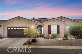 LET'S PLAY GOLF?........Welcome to The 55+ Del Webb Community. Enjoy all the Amenities this Community has to offer.....Gated access for your protection, the pleasing Aspen Club House and nestled against the verdant fairways of the Ashwood Golf Course and a magnificent mountain backdrop. This is an amazing popular single story Home located in Sun City Apple Valley. This Upgraded Home features 3 Bedrooms/3 Baths plus Formal Dining and over 2300 sq.ft. The Home includes the Early California exterior, Stainless Steel Appliances, Upgraded Cabinets and Granite counter tops in the Kitchen. This Community is for active adults age 55+ offers a serene setting. For golfers, the 27-hole, par 65 Ashwood Golf course is your perfect match. The Community offers two fitness centers and full time trainers to guide your workouts. You can join resident clubs, swim in four pools or take part in team sports. Truly a Beauty!