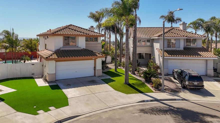 Rancho Del Rey View Home! Nestled on a quiet cul-de-sac, this 3BR/2.5BA residence showcases panoramic views of Downtown San Diego, the ocean, and the Coronado Bridge. The spacious kitchen offers granite counters, a center island, and custom lighting. A welcoming great room—currently configured as a living and dining area—features stylish tile flooring and a cozy fireplace perfect for cool evenings. Enjoy year-round comfort with central AC and a 2-car garage equipped with an EV charging station. The backyard is designed for entertaining, featuring a sparkling pool and an expansive low-maintenance yard. The front has fantastic curb appeal, featuring lush tropical landscaping and lush turf. Upstairs, the primary suite features a private deck, perfect for soaking in sunsets and taking in the sweeping views. Conveniently located near schools, shopping, and freeways. No HOA or Mello Roos!