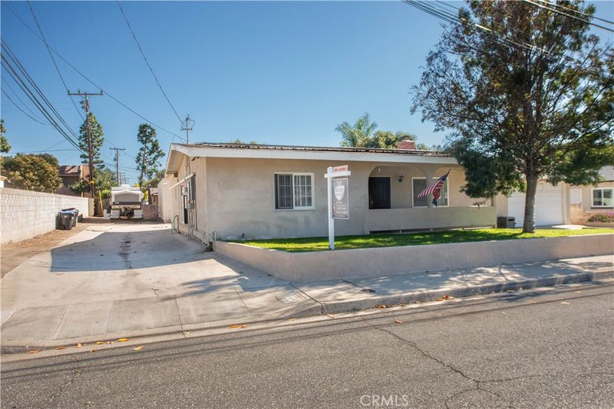 A rare opportunity in Simi Valley’s RVH zoning district—perfect for investors, developers, or homeowners seeking versatility!
This charming single-story home sits on an oversized lot with Residential Very High Density zoning (20.1–35.0 units/acre), allowing for future multi-unit potential. The property includes two garages (one detached with sub panel & plumbing), ample RV parking with dump station, and room for 10+ vehicles. Sustainable features include 26 panel Sun Run solar and a Tesla backup battery.
The home offers 3 bedrooms, 2 baths, a remodeled guest bath, vaulted ceilings, granite kitchen counters, copper plumbing and a spacious enclosed breezeway—ideal as a walk-in pantry or bonus room. 
Enjoy a convenient lifestyle just steps from shops, cafes, and restaurants—this property blends comfort, functionality, and exceptional redevelopment potential. Opportunities like this don't come around often, book your showing today!
This house due to the zoning, includes special financing incentives. Call for further details.