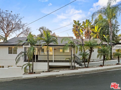 Photo of 10941 Cardamine Place, Los Angeles, CA 91042 (MLS # 26987151)