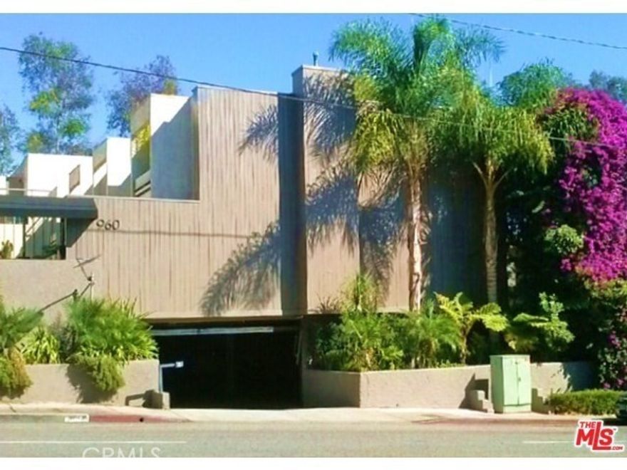Top floor corner unit tucked away in the back of a secured gated 15 condo community. Offering unobstructed views of West Hollywood/Century city. Bottom floor brings you into an open floor living/dining room layout with updated kitchen and all new stainless steel appliances. In unit stackable washer/dryer, vinyl dual pane windows with new vinyl slider door leading to small balcony. Top floor bedrooms have new Carrier brand mini splitters for heating and cooling. Fully remodeled primary bathroom and updated guest bathroom. Recessed lighting throughout both floors. 2 side by side parking spots. Short stroll to both rainbow district for nightlife (Abbey, Roccos, Hi Tops, TomTom, Beaches) and renowned Sunset strip for eateries (Dialog Cafe, Night+Market, Blue Birdy) and entertainment (Whiskey a go go, Viper room, the Roxy). Affordable hoa dues includes water, trash and landscaping, community laundry and small storage. Everything at your fingertips that prime WeHo has to offer making this an exceptional buy. Welcome home!