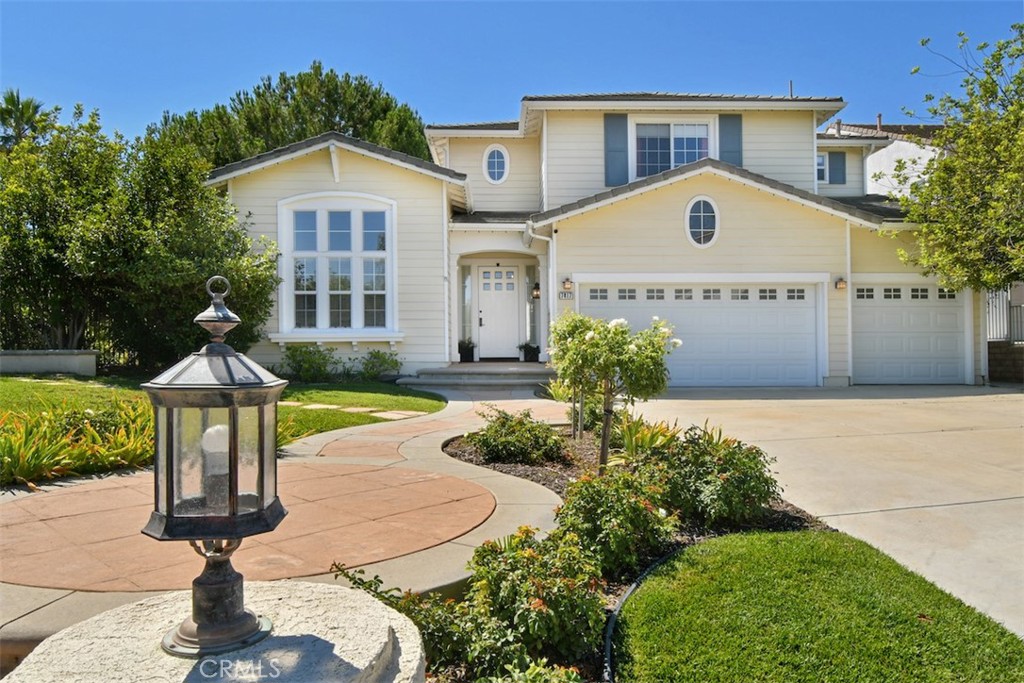 Located within the highly coveted Monte Vista community and boasting five en suite bedrooms, this spectacular pool home offers the perfect combination of comfort, luxury and lifestyle. Enter into an open entryway with soaring high ceilings, leading into an elegant living room with stately built-in bookshelves. A separate dining room, graced by a charming chandelier, brings an old world charm to the home. The heart of the home is the chef’s kitchen, featuring stainless steel appliances, built-in microwave, walk in pantry and a center island with barstool seating. The kitchen includes an eat in area, ideal for a large table. The adjacent family room with a wood burning fireplace and gas hook up option, is perfect for those cozy nights at home. The downstairs includes two bedrooms that share a Jack and Jill bathroom (one ideal as an office), plus an additional powder room. The elegant banister staircase leads to three additional bedrooms upstairs. The primary suite boasts its own sitting area, direct balcony access overlooking your private backyard oasis, walk-in closet with thoughtful built-ins, and a luxurious attached bathroom with dual sinks, large shower and sunken tub. Adjacent to the primary suite is another en suite bedroom, with the third upstairs bedroom functioning like a Junior suite, boasting double door entry, walk in closet and a sitting area/office. A backyard paradise awaits with a pool and spa that features brand new salt water pool equipment and smart LED lighting, a built-in barbecue, covered pergola, grassy lawn, a lemon tree, dwarf palms for privacy, an herb garden, and even resident crows and rabbits that create a nature-forward retreat. The front yard welcomes you with vibrant bougainvilleas and a nearby pathway for family hikes. Impressive home upgrades include newly installed solid hardwood flooring, dual HVAC with brand new, top notch compressors, new recessed lighting and fixtures, a 3-car garage with built-in cabinets, home security system, new Ecobee thermostats and built-in organizers in every closet. This exquisite home sits within a picturesque community that offers daily private security patrol, friendly neighbors and mature landscaping, and is located in close proximity to world-class dining and shopping at Warner Center, the upcoming Ram’s Village, the Grove-inspired Calabasas Commons renovation and Topanga Mall. Zoned to top-notch schools including Hale, Pomelo, El Camino, and the coveted nearby Chaminade private school.