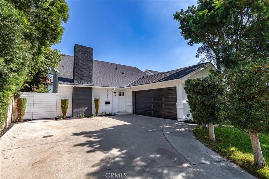 Welcome to a beautifully renovated 5-bedroom, 3-bathroom two-story home in highly desirable Cerritos. Upon entering, you’re greeted by a grand living room with soaring high ceilings and a cozy fireplace, creating an open and inviting atmosphere. The main floor also features a spacious primary suite with a large en-suite bathroom and walk-in closet, plus a second bedroom. The remodeled kitchen boasts a large island, abundant cabinets for ample storage, quartz countertops, and vinyl wood flooring that continues into all bedrooms. The rest of the home features recessed lighting, and custom shutter windows throughout most areas. All bedrooms are generously sized, providing comfort and flexibility for family, guests, or a home office. Upstairs includes three bedrooms and a large loft—perfect for a home office, library, or playroom. The patio provides an ideal space for outdoor entertaining. Located within the award-winning ABC Unified School District, just minutes away from Cerritos Mall, parks, shopping, restaurants, groceries, and major freeways, this home combines comfort, style, and convenience in one of Cerritos’ most sought-after neighborhoods. This property offers the perfect blend of modern living and Southern California lifestyle in the heart of Cerritos.