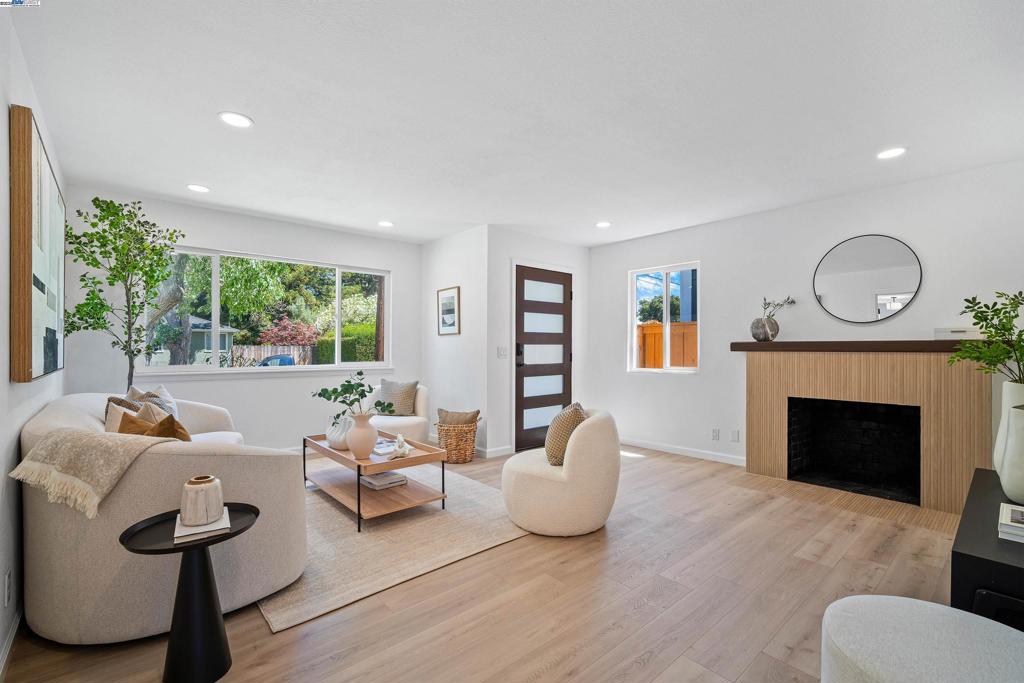 Welcome to 824 14th Avenue—a beautifully remodeled Menlo Park gem featuring two distinct living units designed for comfort, style, and versatility. Nestled on a quiet, charming street with no back neighbors, this home blends privacy and suburban tranquility with unbeatable Silicon Valley convenience. The main house offers 3 bedrooms, 2 bathrooms, and 1,290 sqft of sun-filled living space. A luxury chef’s kitchen with custom cabinetry, high-end stainless steel appliances, and a cozy built-in breakfast nook anchors an open layout that flows effortlessly to the dining and family areas—perfect for entertaining or relaxing at home. The detached 680 sqft ADU features 1 bedroom, 1 bathroom, a full kitchen, independent entry, and its own separate driveway, offering the ultimate flexibility as a private guest suite, executive home office, rental income unit, or independent space for extended family—all while maintaining privacy from the main home. Additional highlights include a rare XL-size 2-car detached garage, new landscaping, and premium finishes throughout. Close to Meta, Google, Stanford, and top-rated schools, this property is the perfect blend of comfort, privacy, and location.