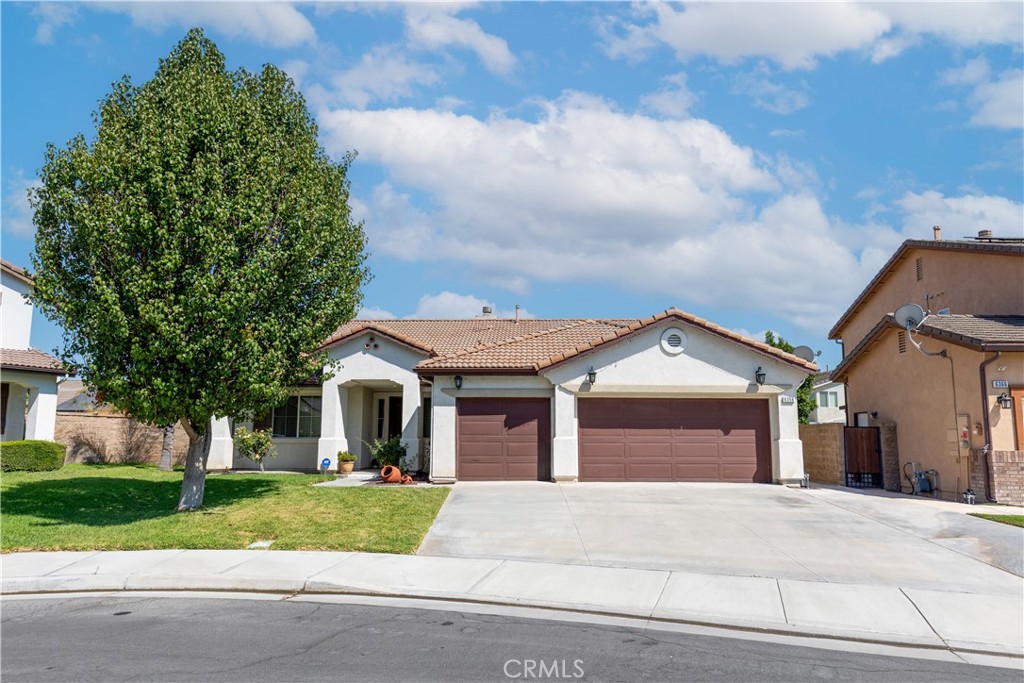 Welcome to your dream home in Eastvale! Nestled on a quiet cul-de-sac in a beautifully maintained suburban neighborhood, this remodeled 4-bedroom, 2-bath residence offers the perfect blend of comfort, style, and functionality. Step inside to find an open, light-filled floor plan with new hardwood floors. The heart of the home is the stunning kitchen featuring a large island, new countertops, and modern cabinetry—ideal for gatherings and entertaining. The spacious primary suite boasts a luxurious bathroom with dual sinks, soaking tub, and walk-in closet, creating your own private retreat. Additional highlights include a 3-car garage with ample storage space, tile roof, and updated backyard with fresh cement slabs and a new patio cover, perfect for relaxing or hosting friends. Located near restaurants and shops, and excellent rated schools. This move-in ready home has been thoughtfully upgraded inside and out, offering a wonderful opportunity for its next family. Don’t miss your chance to own this gem in Eastvale!