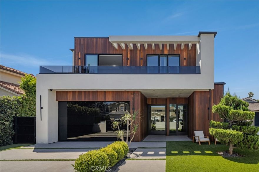 Welcome to 14822 Hesby St, where PRIVACY, vision, precision and elegance converge. A striking newer construction estate that blends modern design with luxury. This state-of-the-art smart home showcases a dramatic glass staircase, soaring high ceilings, and expansive glass pocket doors that open to a seamless indoor-outdoor experience. The chef’s kitchen is a showpiece, featuring dual oversized islands, a sleek breakfast bar, and inspiring white oak floors throughout. Retreat to the primary suite with its spa inspired bath, spacious walk-in closet, and two private balconies with sitting area and fireplace. Outside, a resort-style pool, spa, and cabana create the ultimate setting for relaxation and entertaining. Built by MLR Development one of Los Angeles’s most reputable builders, this residence is a sanctuary of abundance designed for seamless living and timeless beauty.