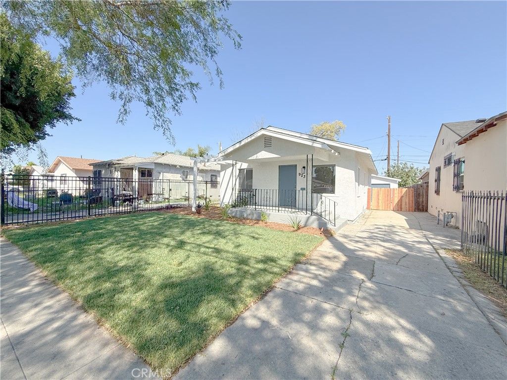 Photo of 923 E 97th Street, Los Angeles, CA 90002 (MLS # IG26054248)