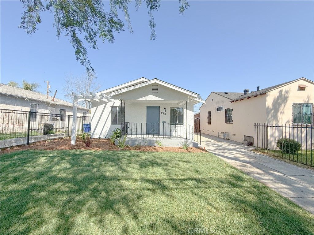 Photo of 923 E 97th Street, Los Angeles, CA 90002 (MLS # IG26054248)