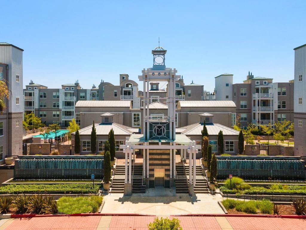 Experience modern elegance and everyday ease in this updated 3rd floor condo in the sought-after-resort-style Miraval community. The inviting living room features brand new laminate floors and large windows framing beautiful tree-top views, opening to a private balcony that overlooks the peaceful courtyard. The modern kitchen is upgraded with a large center island, granite countertops, subway tile backsplash, and stainless-steel appliances. The spacious bedroom enjoys brand new carpet and serene green views, while the bathroom features elegant finishes and a shower over tub. Enjoy year-round comfort with central AC and heating, plus an in-unit washer and dryer for convenience. Miraval offers resort-like amenities including a swimming pool, spa, fitness center, clubhouse, theater, and business center, plus EV chargers and secure gated access. Located just minutes from Rivermark Plaza, parks, Guadalupe Trail, and top tech companies such as Nvidia, Cisco, and Oracle, with the Google bus stop right outside.