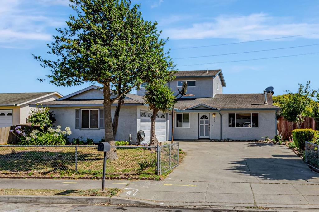 Welcome to 250 Arroyo Drive, quit paying rent, and start building equity in your own home. This spacious, 4 bedroom, 3 bathroom home offers an abundance of space to fit all your needs. Whether entertaining family and friends in the large kitchen and dining area, or enjoying wine or hot chocolate on those cold nights gathered around the wood burning stove in the living room, this home will be the catalyst for many happy memories. And if you need privacy, retire to your upstairs bedroom suite, which includes full bathroom and large closet with built-in shelving. Three more bedrooms and two more full bathrooms downstairs make this home perfect for any living situation. The oversized two car garage is perfect to store your cars, tools, toys, and more. The extra-long driveway is suitable for an RV, boat, or additional cars. Once outside, enjoy the beautiful Watsonville sunshine in your spacious backyard. Both front and back yards are blank slates, ready for your gardening inspiration. As an added bonus, the side yard could serve as a fenced dog run or possibly more storage. So stop paying someone else's mortgage, and start building your own equity in something real. Come make this your new home.