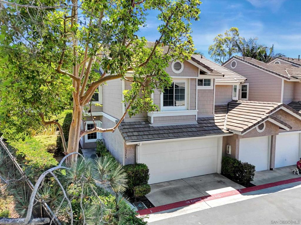 Bright and inviting corner unit, 3BR/2BA, 1,479 sq. ft. townhome in the desirable Carmel Valley community of Pacifica. Freshly painted in modern tones with new LVP flooring, recessed lighting, and a mix of stainless appliances. Open living/dining area with vaulted ceilings and fireplace, plus private outdoor patio. Primary suite features vaulted ceilings and ample closet space. Community amenities include pool, spa, and tennis courts. Excellent location near top-rated schools, shopping/dining at One Paseo & Del Mar Highlands, easy freeway access, and minutes to Torrey Pines Beach.