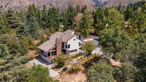 Photo of 39155 Harris RD, Oak Glen, CA 92399 (MLS # IG26189600)