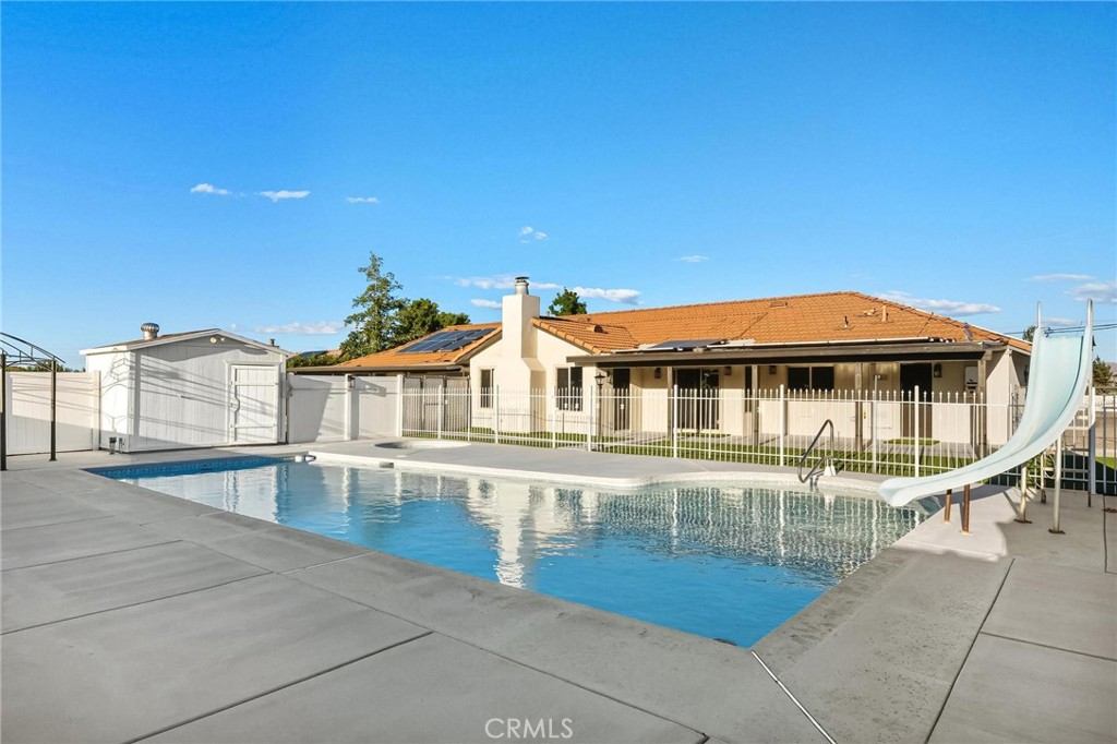 Completely Remodeled Custom Home on Over an Acre with Pool & Owned Solar
Fall in love with this stunning single-story 4 bedroom, 3 bathroom custom home that has been fully remodeled from top to bottom and offers the perfect blend of luxury, comfort, and functionality. Set on over an acre in Hesperia, this property is move-in ready and designed to impress — all with NO HOA and ultra-low energy bills thanks to owned solar.
From the moment you step inside, you’ll notice the warmth of the open floor plan, the fresh designer paint, and the glow of recessed LED lighting paired with upscale fixtures that add a touch of elegance throughout. Brand-new luxury vinyl plank floors lead you through formal living and dining rooms and into the all-new chef’s kitchen, complete with quartz countertops, stainless steel appliances, a large walk-in pantry, and a sunny breakfast nook perfect for morning coffee or late-night gatherings.
Large family room with vaulted ceilings, brick fireplace and build in shelving, enough space for you and your 20 closest friends!
The spacious bedrooms and completely remodeled bathrooms provide comfort for everyone, while the private primary suite feels like a retreat with its spa-like bath featuring marble-look tile floors, dual vanities, and a frameless glass shower enclosure. Every detail has been carefully upgraded, including modern interior doors and trim, new dual-pane windows, energy-efficient sliding doors, upgraded electrical panel, and even an epoxy-coated garage floor for car enthusiasts or hobbyists.
Step outside and enjoy true California living. A circular driveway with paved side access leads you to the expansive backyard, where gated entry provides space for RVs, toys, or even a future workshop. The fenced-in pool area is perfect for entertaining, complete with a sparkling pool that was just replastered and had LED lights installed and a full outdoor bathroom for added convenience. The large lot provides endless opportunities — from gardens and play areas to space for animals or a dream outdoor oasis.
With central heat and air, owned solar, upscale lighting inside and out, and every major system updated, this property is the definition of move-in ready. Don’t miss this rare opportunity to own a completely upgraded custom home with space to live, relax, and entertain.