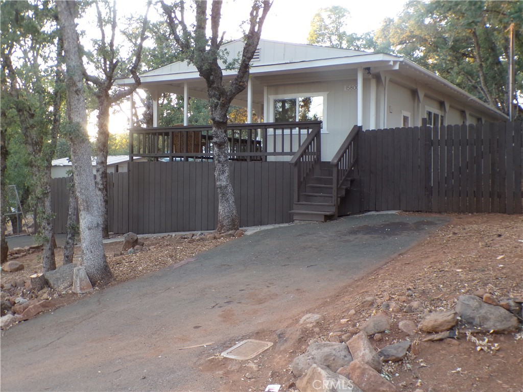 The amazing remodeled home has been completely updated and it came out beautifully! New siding, new skirting, new roof, new paint, rebuilt deck, remodeled interior, amazing tiled bathrooms, new flooring, new counters, new appliances, new new new NEW! Inside is a dream it's cozy yet feels spacious at the same time. The living area is well laid out and the flow feels perfect! Outside is also incredible you have a TRIPLE SIZED LOT with two driveways! Plenty of room for RV parking and far more. This home really has to be seen to be appreciated! Priced to sell make your appointment to see this one of a kind home. Whether you are looking for a comfortable vacation home or an everyday residence this is worth checking out. Close to dining, shopping, entertainment, schools and best of all only a five minute drive to the lake!