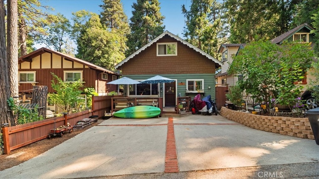 This charming Crestline home features a gorgeous fireplace as the focal point of the living room, recent updated kitchen, new wall heater, water heater, wood custom dutch front door, double-pane windows, fresh interior/exterior paint, new flooring, interior laundry area and a brand new stove. IDEAL for full time living, weekend retreat, or investment—don’t miss this opportunity! Priced to sell quickly!
Come and Enjoy peaceful mountain living just walking distance from Lake Gregory! Nature, nature, nature!!