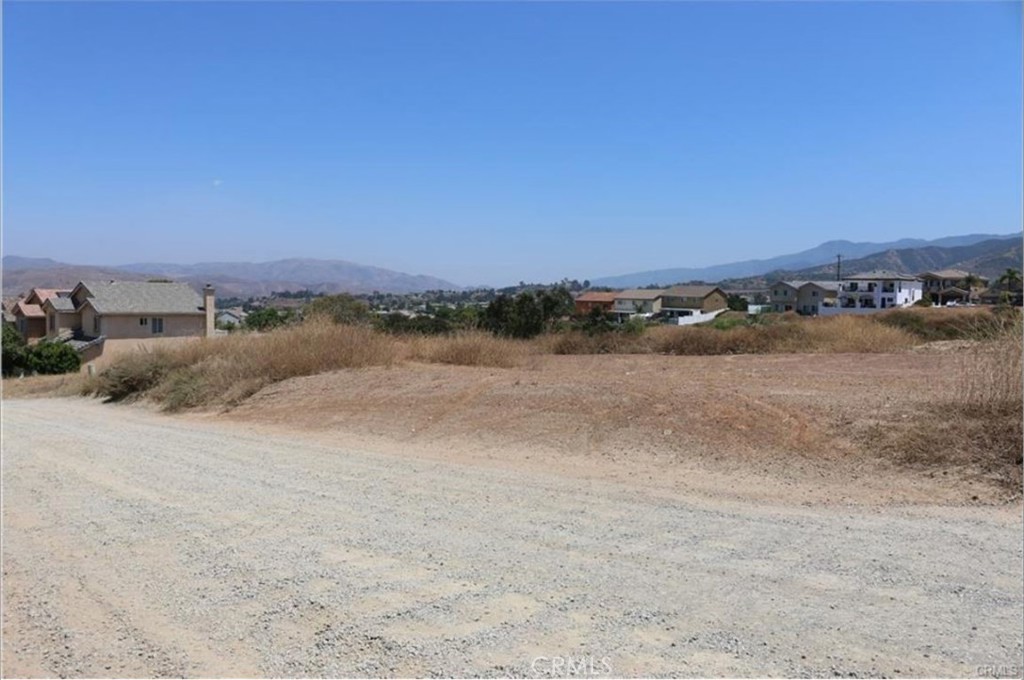 Developers' Dream. Build your own Custom Home. Rare South Corona land on top of the hill with beautiful views in a very prestigious neighborhood of South Corona with over 6,500 sq. ft. of land very desirable neighborhood. Quiet, serene neighborhood with easy freeway access. Close to all freeways, Dos Lagos shopping centers, movie theatres, restaurants, parks, and within walking distance to great schools. Please verify with the City of Corona planning department the land description, all utilities, and do your own diligence. Hurry will not last.