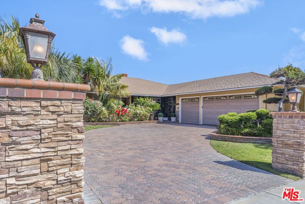 Welcome to this charming traditional home nestled in the heart of Ladera Heights, where comfort and elegance converge seamlessly. This inviting residence boasts a classic design, offering a perfect blend of spaciousness and warmth.Step inside to discover a generous layout featuring 4 bedrooms and 3 bathrooms, providing ample space for family and guests. The formal dining room, family room, and den offer versatile living spaces, ideal for both relaxation and entertaining. The primary bedroom is a true retreat, featuring a large ensuite with a separate shower and jacuzzi tub for ultimate luxury.The heart of the home lies in its well-appointed living areas, where the open and bright cook's kitchen awaits, inspiring culinary creations with its ample storage space. Bring the entertainment outside to your private oasis, complete with a sparkling pool with a waterfall feature and a relaxing hot tub.With its impeccable spacious layout and desirable location, this property presents a rare opportunity to own a truly exceptional home in one of Ladera Heights' most sought-after neighborhoods. Don't miss the chance to make this modern oasis your own.