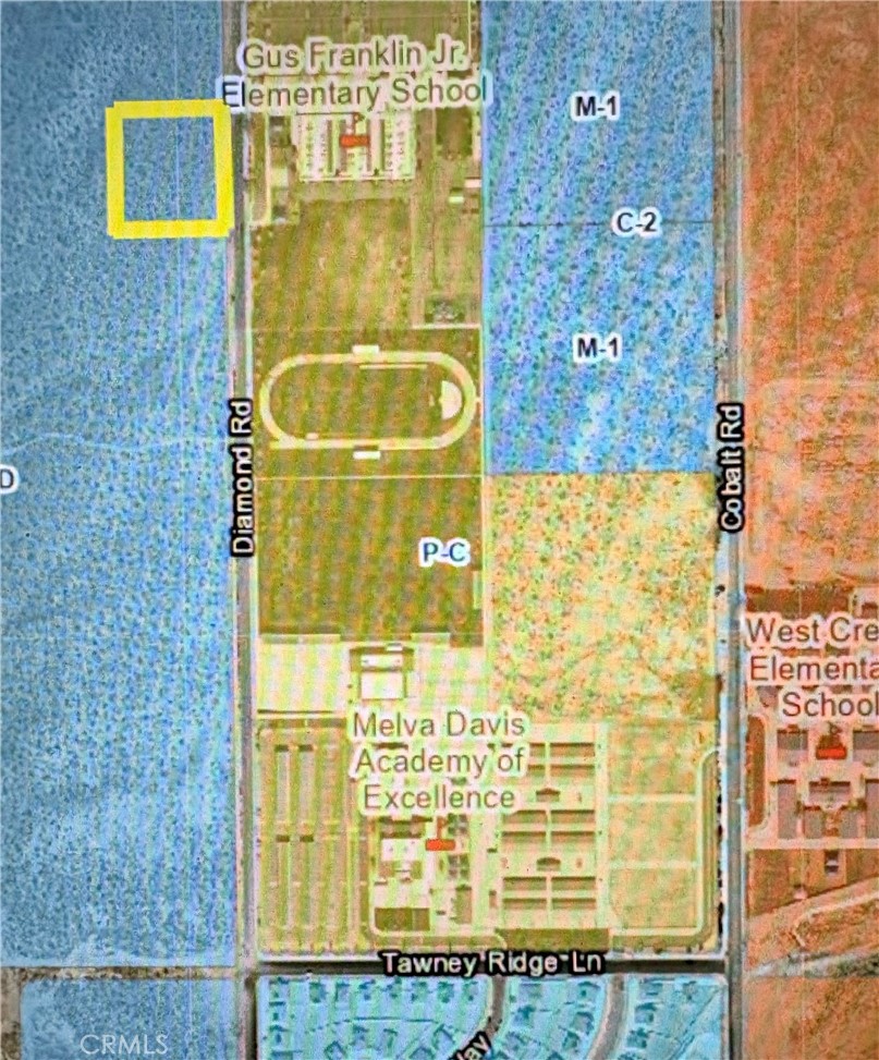Located directly across the street from brand new Gus Franklin Jr Elementary School, This large industrial site provides a great inexpensive location. Utilities are near by. Diamond Rd is direct fully paved access to property. Great investment property. The path of growth has many housing tracks in progress. Shopping and freeway access on Mojavi Dr. Sellers are very motivated.