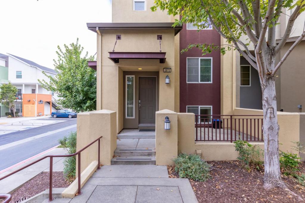 Nestled in Devon Square, this modern 3-bed, 2.5-bath townhome-style condo blends suburban tranquility with urban convenience. Built in 2006, the 1,555 sq ft corner unit spans three light-filled levels with flexible living space. The main floor features an open-concept layout ideal for daily living and entertaining, with a bright living/dining area, a well-equipped kitchen with breakfast bar, and a powder room. Upstairs offers three bedrooms, including a primary suite with walk-in closet and spa-like bath with dual vanity, soaking tub, and separate shower. A full hallway bath and in-unit laundry complete the top level. The lower level includes a versatile family room perfect for a home office or media lounge with direct access to a 2-car side-by-side garage. Enjoy a welcoming front patio and nearby trails at Point Pinole Regional Park. Just minutes from local dining, shopping, and transit, this home is a stylish and convenient Bay Area retreat.