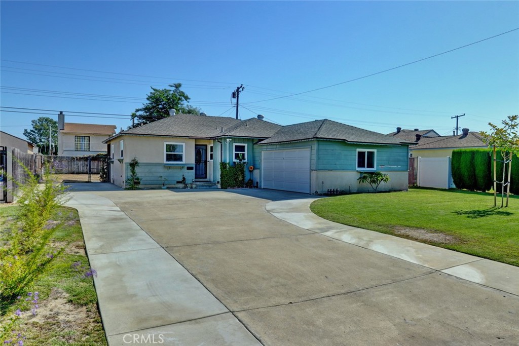 Tucked away on a quiet street in Garden Grove, this beautifully upgraded single-level home sits on a spacious lot with exciting potential for investors or first time buyers, including approved plans for an ADU! Renovated extensively in 2023, the home features a remodeled kitchen with new counters, cabinets, and tile flooring, plus updated bathrooms and fresh vinyl flooring throughout. Recessed lighting in the living room, hallway, and kitchen adds a modern touch, complemented by light interior paint and ceiling fans in every room. The ceilings have been smoothed for a clean, contemporary look.
Additional upgrades include newer dual-pane windows in 2018. Copper plumbing, a tankless hot water heater and a new electrical panel and power lines were added in 2023. A brand-new heat pump A/C system was installed in 2024. The exterior was freshly painted, and partial backyard irrigation was added in 2023. Plans for an ADU were submitted to the City of Garden Grove and received one-year approval in 2023—giving the next owner a valuable head start on expanding the property.
Step outside to enjoy Disneyland fireworks from your expanded driveway with RV parking potential, or explore the area's abundant shopping, dining, and entertainment just minutes away. Whether you're looking to move right in, invest, or expand, this turnkey home offers endless possibilities in a fantastic location.