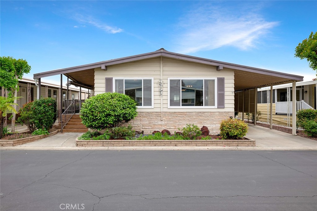 Charming 2-Bedroom Manufactured Home in Desirable 55+ Lake Forest Community! Welcome to this beautifully maintained manufactured home in one of Lake Forest’s most desirable 55+ communities. Ideally located just off the El Toro Freeway and within walking distance to top shopping and dining, this spacious 2-bedroom, 2-bathroom residence offers 1,728 sqft of comfort and style. Enjoy a bright, open floor plan filled with natural light and charm—perfect for relaxing or entertaining. The home is equipped with central A/C to keep you cool year-round, and features a large living area, functional kitchen, and plenty of room to make it your own. A covered carport offers convenient parking, and two additional storage sheds provide extra space for tools, hobbies, or seasonal items. Residents enjoy fantastic community amenities, including a sparkling pool and spa, tennis courts, and beautifully maintained grounds—all contributing to a vibrant and active lifestyle. Don’t miss this clean, move-in ready home in a prime Lake Forest location!