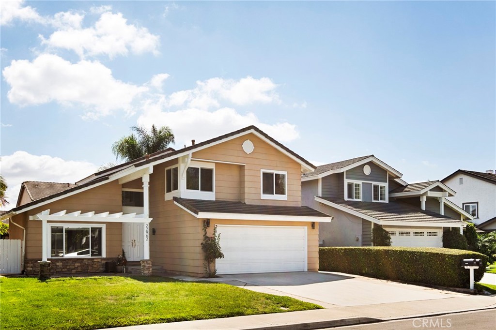 Turn-Key ready remodeled home awaits its new owners! Spacious 3 Bedroom 2 1/2 Bath with a resort-style backyard located in a quiet, family-friendly neighborhood. A well-laid-out floor plan features cathedral ceilings in the entry, family, and dining rooms, with recessed lighting throughout. Dual-pane windows/sliders ensure energy efficiency; updated kitchen with granite countertops and stainless appliances that open to the family room. A new HVAC heating and air conditioning unit was just recently installed. All bedrooms receive ample natural light from the windows. As for the baths, they have been updated; the Master was completely remodeled with custom frameless sliding glass doors, dual sinks, new countertops, and a custom mirror. Step outside, and you are greeted with lush natural turf grass with natural stone pavers and greenery plants all along the walls. Get ready to entertain with a built-in BBQ and a Countertop with 6 highchairs. Built-in refrigerator and stainless-steel tub keep your drinks cold. Lie down on the Hammock, chat with loved ones around a custom-built fire pit, or play around with the custom golf putting green. Or be cozy inside, there's a fireplace there too. Great location, close to freeway, shopping, schools, and parks. Unlike Irvine, there are no other assessments or Mello Roos. Put in your offer!