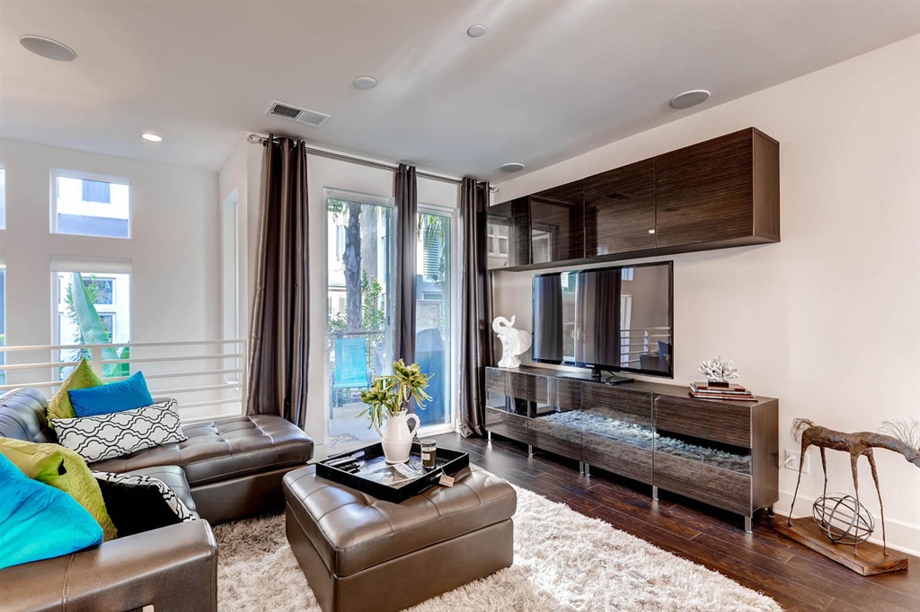 Welcome to Civita, San Diego's best kept secret. This 3 story townhome has modern California design, luxurious finishes, an open floor plan. 2 master suites upstairs plus a bedroom and bath on the entry level, ideal for guests. Gourmet kitchen has hi-tech appliances. Engineered hardwood on the main floor. Recessed lighting, energy efficient appliances and low water use plumbing. Surround sound. Keyless entry, 2 car attached garage. Neighborhoods: Civita Equipment: Garage Door Opener, Range/Oven Other Fees: 50 Sewer: Sewer Connected Topography: LL