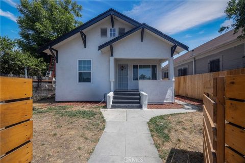 Photo of 1471 E 41 PL Pl, Los Angeles, CA 90011 (MLS # MB25232806)