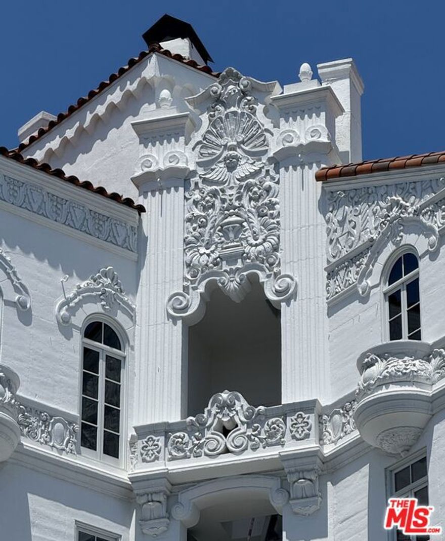 Live in a piece of Hollywood History.  Enjoy your success ~ For decades occupied by the brilliant cinematographer Conrad Hall (and earlier by Burl Ives) 603 is the gorgeous and romantic northern penthouse  in the luxurious immaculately restored El Mirador.  It is grand and elegant with a working fireplace and its ballroom sized living room...(which might be just perfect as a ballroom).   It has a state of the art sound system, the mirror changes into a screen and it becomes a home theatre.  Overlooking the City and Hollywood hills from three exposures, there is wonderful light and great lighting throughout with a mix of recessed, original iron Spanish fixtures and extraordinary modern ones.  The master bedroom is dramatic with its soaring ceiling as is the stunning marble master bath (with loads of closet space.) There are outdoor balconies on both the east and the west side off the chefs kitchen and the formal dining room.                                       * Overview *                                                                                                 The iconic El Mirador is a luxurious newly restored historically designated building.  Built in 1929 by the master designer of movie palaces, S. Charles Lee, every original architectural detail has been immaculately restored inside and out.  All apartments are rich with historic detail, yet, the building also has all new infrastructure and beautifully finished new kitchens and baths.  Kitchens have top of the line Thermador appliances, washers and dryers and all apartments have central A/C.                         ~                                                                                                      There are electric charging spaces in the garage. Unfortunately, this is a strictly no pets building.