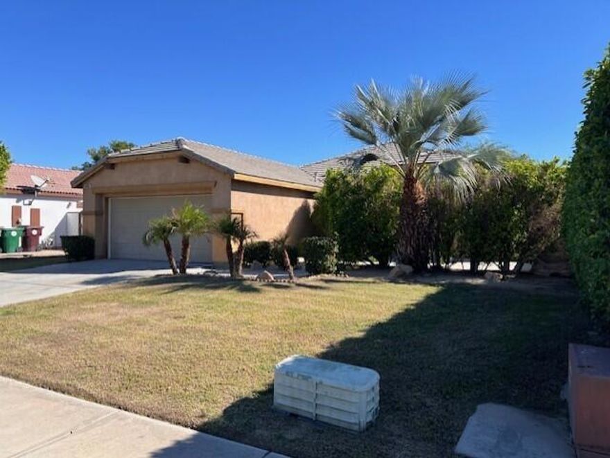 What a Wonderful Family Home in a nice neighborhood with a park only a hop, skip and jump away for the kids to run and play in.  On the East side of house it's shady, inviting, and has a rear concrete patio for those nice evenings with the family and or guest.    The large Kitchen opens a huge Great Room.  New stainless self cleaning range/oven,  new stainless dishwasher,  and a  nice Over The Range Microwave.  Newly installed kitchen sink and counter-tops freshly re-grouted.  Ample kitchen cabinets in a large U-Shape.   The oversize impressive living room can easily be divided into two parts for a living room and family room, or area, as desired.   This wonderful home was Professionally Painted in October 2025. including Ceilings, Closets, Bathrooms, Kitchen, Pantry, and Garage.  New 6-panel Bypass Wardrobe Colonial Doors were just installed three of the bedrooms.   Double Door Pantry,  Coat Closet, linen cabinet with folding area atop and wide hallway. plus, a  Separate Laundry-room with new led light fixture,  with gas hook-up for dryer.   Master bath has separate shower and tub.  His and Her sinks, plus a very large walk-in master closet.   Master bedroom has a 14'' X 14''  Return Air filter for good circulation. and  a 20 X 30'' filter intake in hallway.  3-Bedrooms have brand new Wardrobe, 6-panel Colonial bypass doors.    All new smoke detectors, new Carbon Monoxide Detectors.  Air-conditioner has been serviced and meets FHA Standards.  New makeup led lighting installed in both bathrooms.   New flooring, Vinyl Plank, Sheet Vinyl in bathrooms, and Carpets are being installed and scheduled to be completed by 10/22.   Automatic sprinklers system,  Title roof,  Automatic Garage Door Opener with two new remotes with door and opener has recently been serviced and the Garage is Professionally Painted.   Some new blinds have been installed.      Save money on gas when going shopping, banking, postal assistance, coffee, groceries, dinning, pharmacy.  It's all within one mile (maybe closer/)   Ave. 48 with give you direct access to Dillon Highway to I-10 east or west and the Express Way South or West to connect with I-10.  Or, both Spot Light or Fantasy Casino.   And only 3-Miles to Augustine Casino.   You'll will not likely be able to find a more complete property, in this condition,  at this size, and at this price.   Note:  Pictures will be updated as work is completed.  Completion target date is October 22nd.