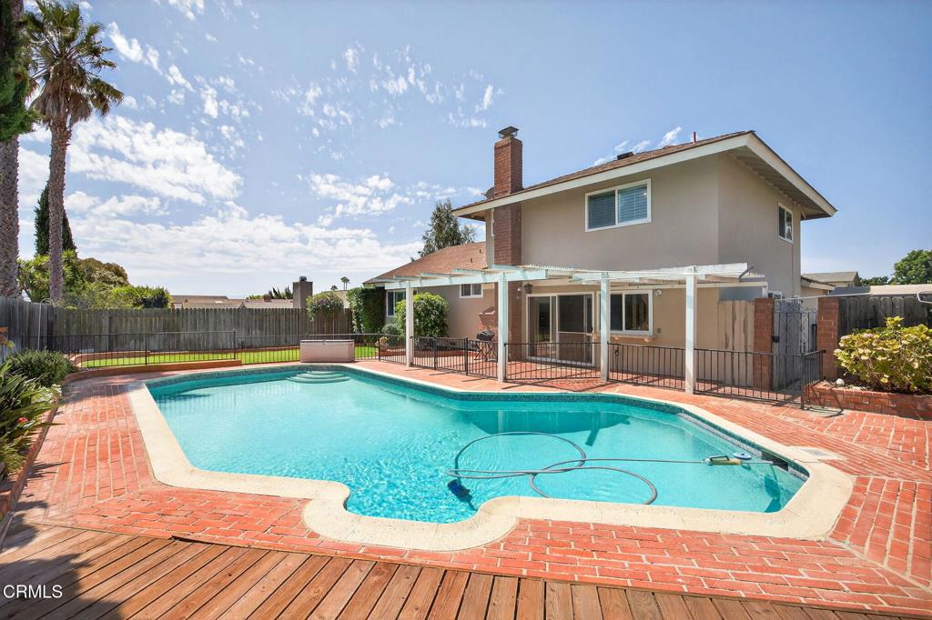 Welcome to Your Dream Home in Desirable Camarillo Heights!Located on a peaceful, tree-lined street in one of Camarillo's most desirable neighborhoods, this charming two-story pool home offers the perfect blend of comfort, character, and location. With 4 bedrooms, 2 bathrooms, and approximately 1,800 sq ft of living space on a spacious 7,405 sq ft lot, this home is designed for relaxed California living.A grand double-door entry leads into a bright and welcoming living room with soaring ceilings and an open, airy feel. Plantation shutters and newer double-paned windows throughout the home provide energy efficiency and timeless style.The cozy family room features a gas-burning fireplace--perfect for quiet evenings at home--while the adjoining dining area flows seamlessly into an updated kitchen complete with granite countertops, new cabinetry, and a picture window overlooking the backyard and sparkling blue pool.The first-floor primary suite offers privacy and convenience, with a generous walk-in closet and an updated ensuite bathroom featuring a modern step-in shower.Upstairs are three spacious bedrooms and a full bathroom--ideal for kids, guests, or a home office setup.Step outside to your private backyard oasis--an entertainer's dream! The fenced-in sparkling pool provides fun and safety for families.....perfect for these warm days, and the large grassy area offers plenty of space for pets, playtime, or friendly games.Additional features include a two-car garage, RV parking for all your toys and adventure gear, and a location just one block from Foothill Park. Best of all, there's no HOA.With a spacious layout, thoughtful upgrades, and an unbeatable location close to top-rated schools, shopping, and dining, this Camarillo Heights gem won't last long. Come see it for yourself!