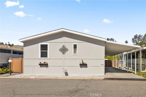 Photo of 4901 Green River Rd #303, Corona, CA 92880 (MLS # PW26052365)