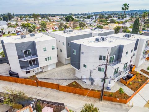 Photo of 1818 Thurman Ave, Los Angeles, CA 90019 (MLS # BB26055829)