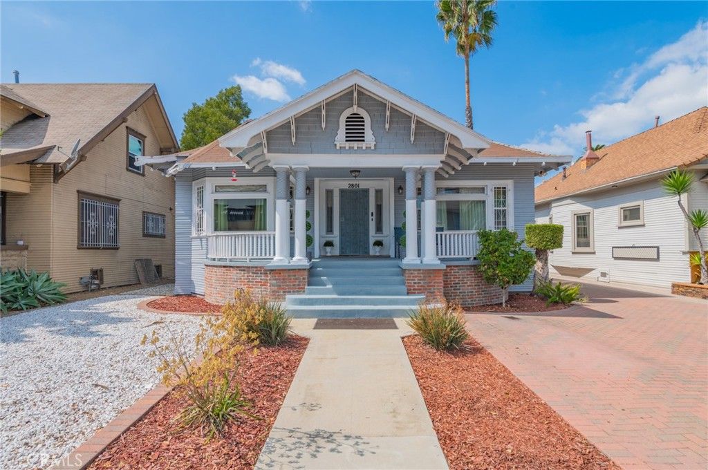 Photo of 2801 Brighton Avenue, Los Angeles, CA 90018 (MLS # OC25233977)