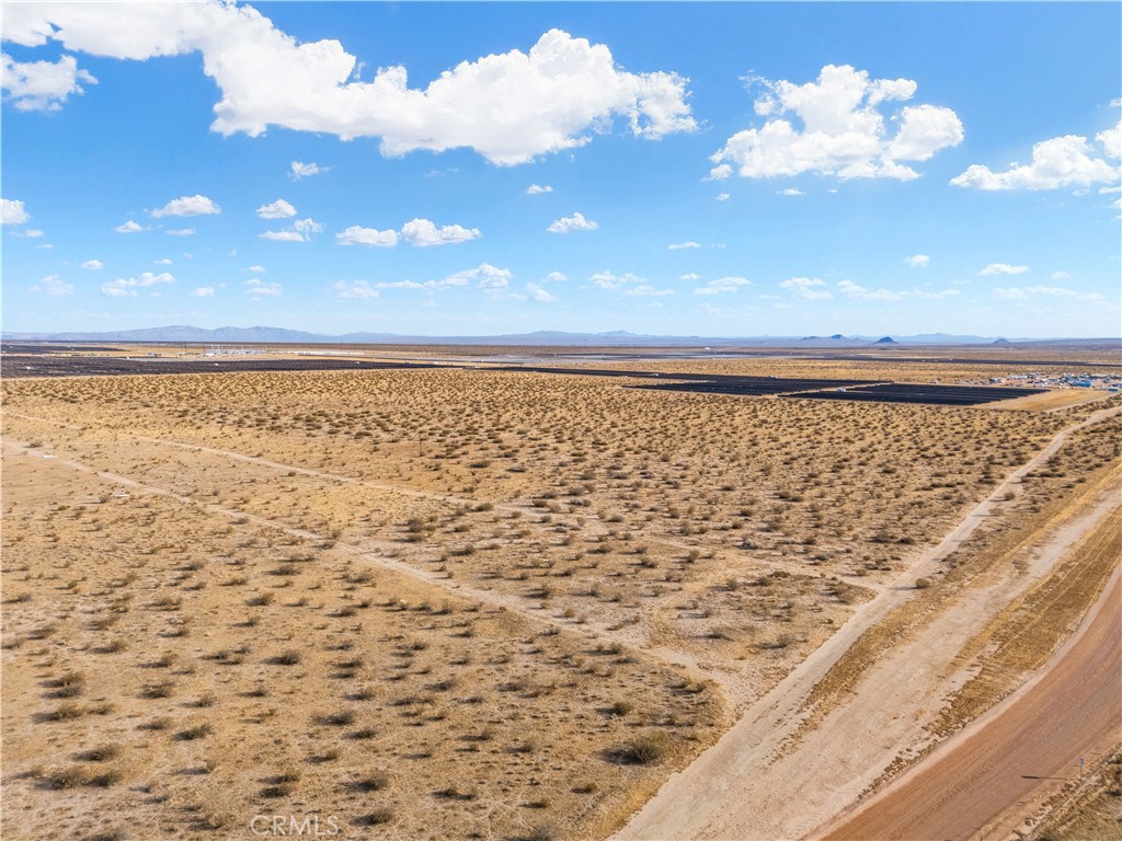 Discover your own slice of paradise with this expansive 2.5-acre vacant lot located in the heart of the Mojave area. This prime piece of land offers a unique opportunity to build your dream home or investment property in a serene desert setting, with breathtaking views and endless possibilities.