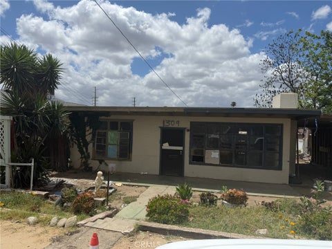 Photo of 1309 Tourmaline Avenue, Mentone, CA 92359 (MLS # IG26119777)