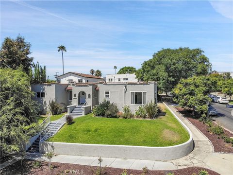 Photo of 1301 S Hudson Ave, Los Angeles, CA 90019 (MLS # SB26040870)