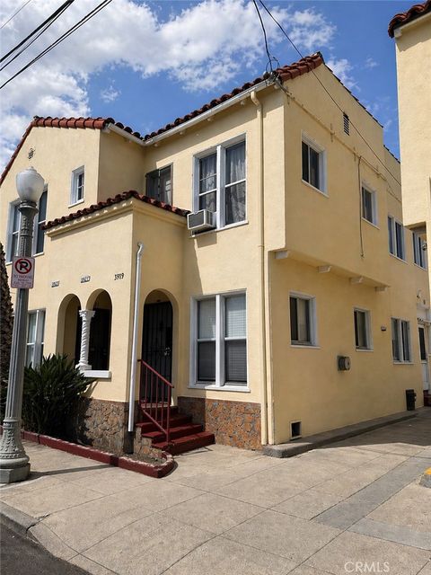 Photo of 3919 Walton Avenue, Los Angeles, CA 90037 (MLS # SB26088573)
