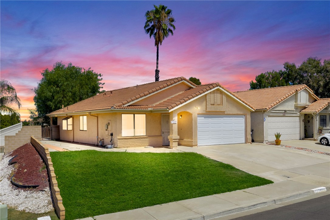 Welcome to this charming 55+ low-maintenance single-story home in the heart of Menifee! This 2-bedroom, 2-bath residence offers 1,077 sq ft of comfortable living space with an open and functional floor plan designed for everyday comfort and convenience.
Step inside to a spacious living room with central A/C and large windows that flood the space with natural light, creating a bright and welcoming atmosphere. The kitchen comes fully equipped with a dishwasher, fridge & ample cabinet storage, while the adjacent dining area makes entertaining and daily meals easy. An in-home laundry area with washer and dryer is included for maximum convenience.
The private primary suite features a walk-in closet, a full bath, and direct access to the backyard. Outside, enjoy a covered patio perfect for morning coffee, weekend barbecues, or simply unwinding in your own low-maintenance yard. The attached two-car garage provides secure parking and extra storage. This home is in good condition and ideally located just minutes from the 215 freeway, making commuting a breeze. You’ll also appreciate the close proximity to three major medical facilities, shopping centers, restaurants, schools, and all the amenities that make Menifee such a desirable place to live. Best of all, the property is situated in a quiet, established neighborhood with no HOA and low property taxes—a rare combination that offers both value and peace of mind. Whether you’re a first-time buyer, looking to downsize, or an investor seeking a solid rental opportunity, this move-in-ready home checks all the boxes. Association includes a clubhouse, sport court, common area landscape, pickleball, community pool. Don’t miss your chance to own in one of Menifee’s most convenient and growing locations! Digitally staged to show potential.