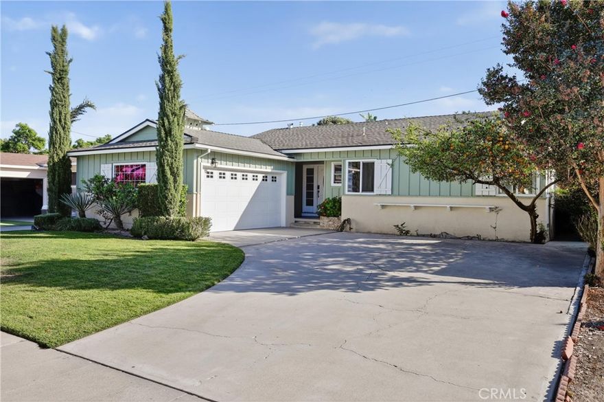 Welcome to your dream home on a picturesque tree-lined street in Fullerton! This stunning upgraded single-story residence boasts an inviting open-concept design, where natural light fills the spacious dining and living areas. Enjoy the elegance of hardwood flooring, contemporary light fixtures, and modern vinyl windows throughout. The gourmet kitchen is a chef's delight, featuring crisp white cabinetry, luxurious quartz countertops, a stylish glass tile backsplash, and stainless steel appliances—perfect for entertaining. Cozy up by the quartz-surrounded fireplace in the living room, creating a warm ambiance for gatherings. Retreat to the expansive primary bedroom (20’ x 12’), complete with dual "his" and "hers" closets and a personal retreat space. Two additional well-appointed bedrooms offer mirrored sliding closet doors, providing ample storage. Both bathrooms have been meticulously upgraded with custom tile work, frameless glass door showers and dual vanities. Step outside to your private backyard oasis, featuring a covered patio, custom flagstone hardscape, lush grass, and mature landscaping with fruit trees, ideal for outdoor relaxation and entertaining. Currently a profitable Airbnb so make this your home sweet home or continue making money with this turn key EVERYTHING included in home as you tour, fully Furnished. Ask us more about Airbnb opportunity!