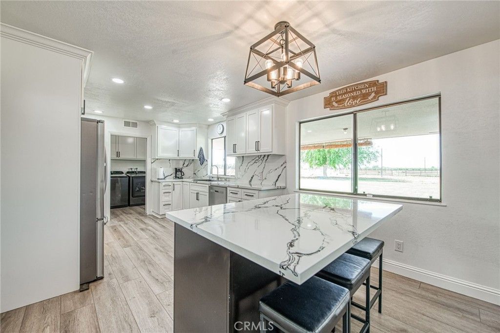 Photo of 3377 N Bryan Ave, Fresno, CA 93723 (MLS # FR26066708)